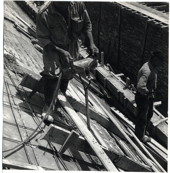 Detalle de construccin, obreros trabajando